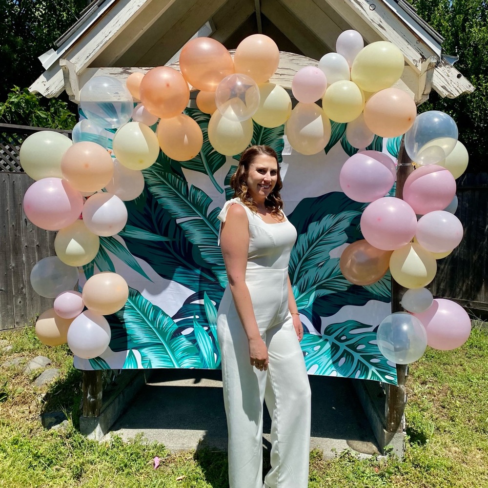 White Lulu’s jumpsuit, perfect for wedding events or really anything!